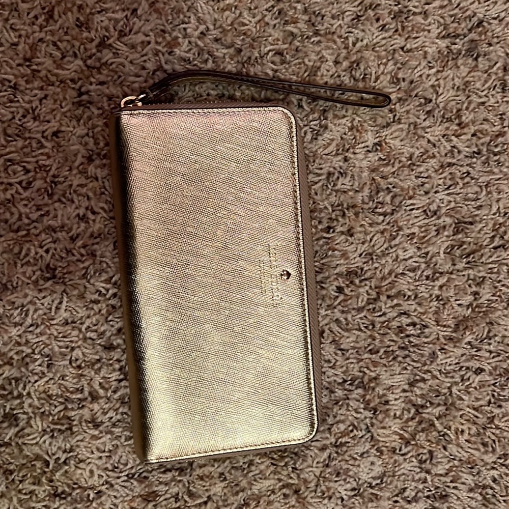 Gold Kate spade wristlet
